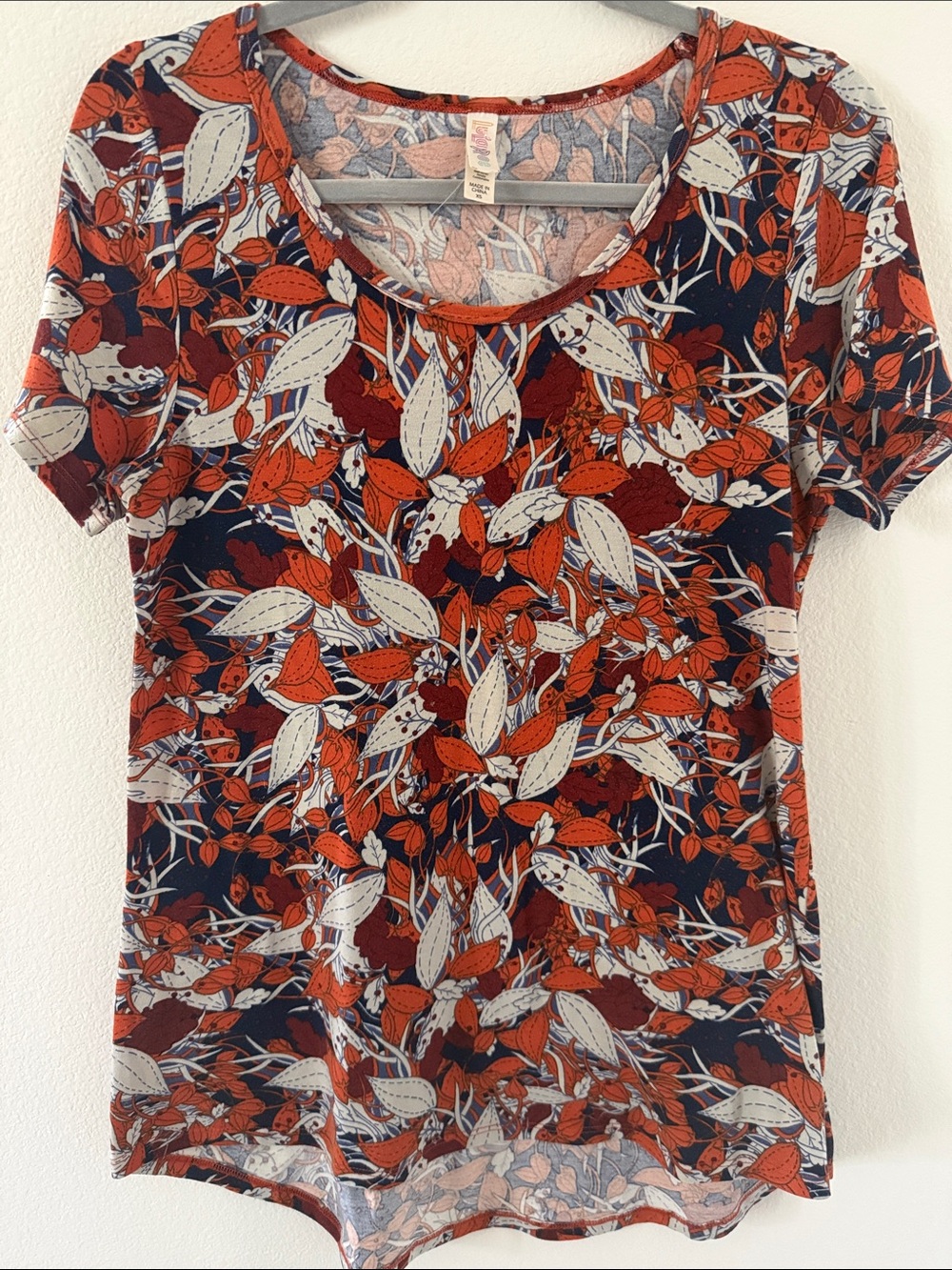 LuLaRoe Orange, Cream & Navy Floral Short Sleeve Tee